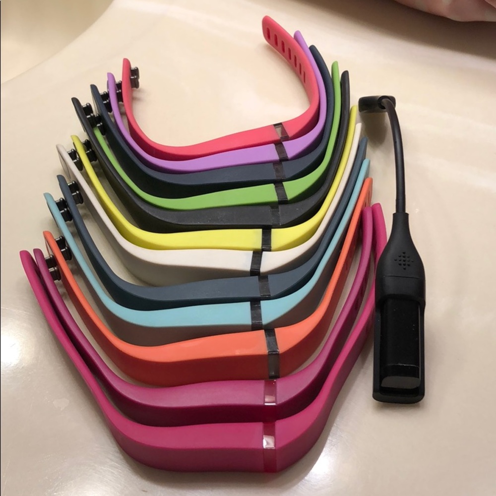 Fitbit Flex with charger and 12 bands